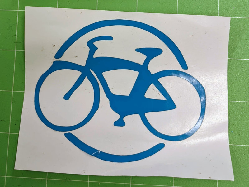 the vinyl outline of a bicycle shaped sticker