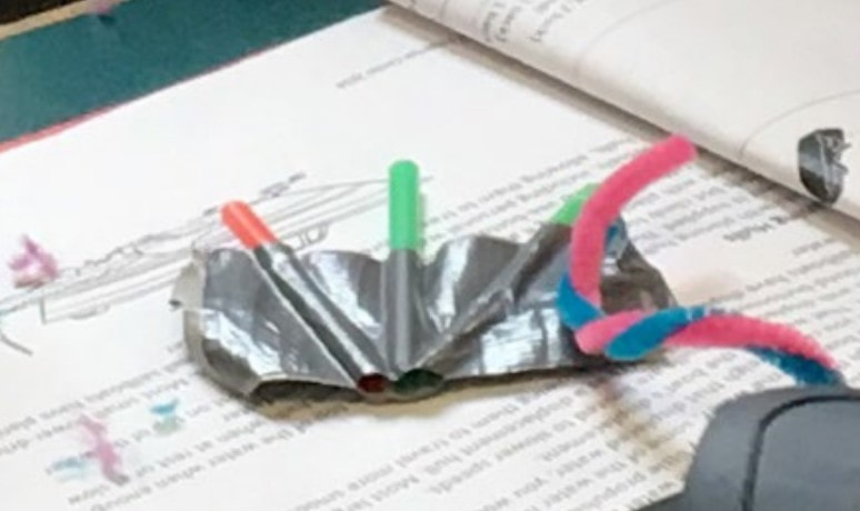 model of webbed foot made of duct tape and drinking straws