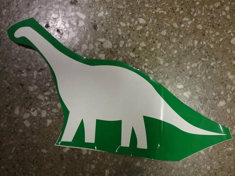 the vinyl outline of an apatosaurus-shaped sticker