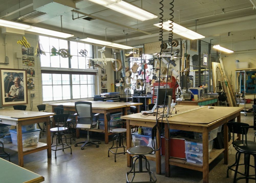 Edgerton center maker space, featuring big windows, large work tables and fun projects decorating the walls