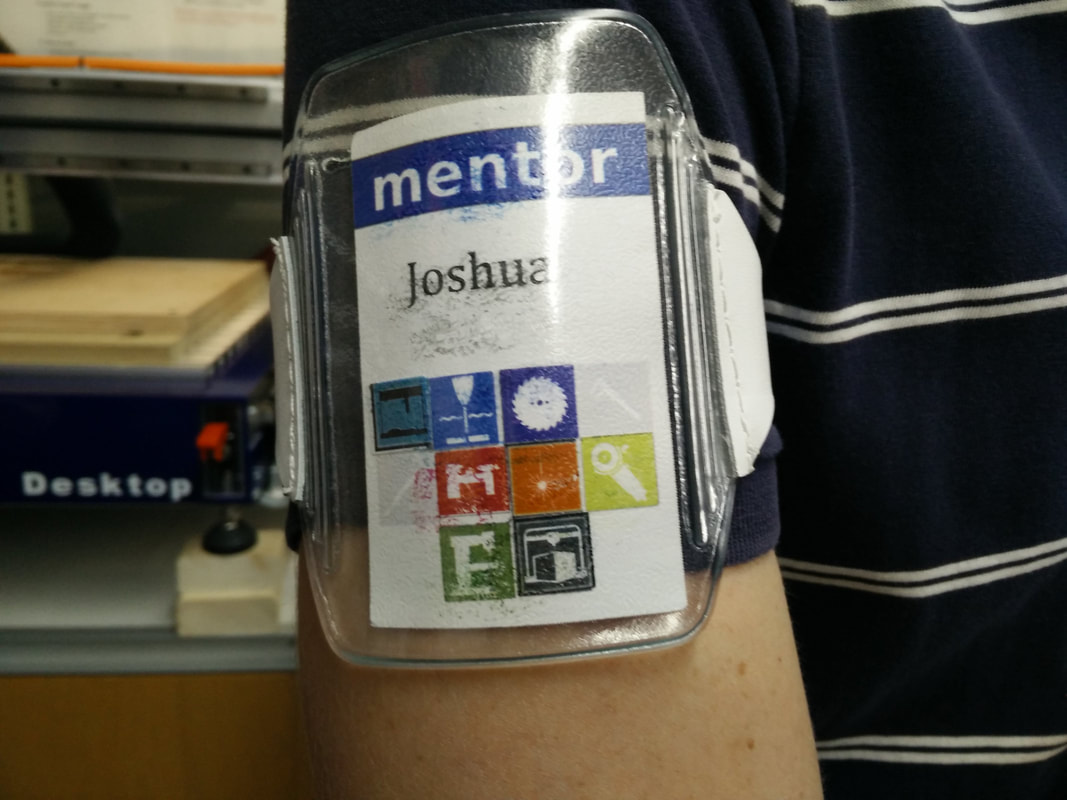 photo of a mentor name tag worn on an arm cuff