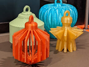 Photo of holiday ornaments created with Tinkercad