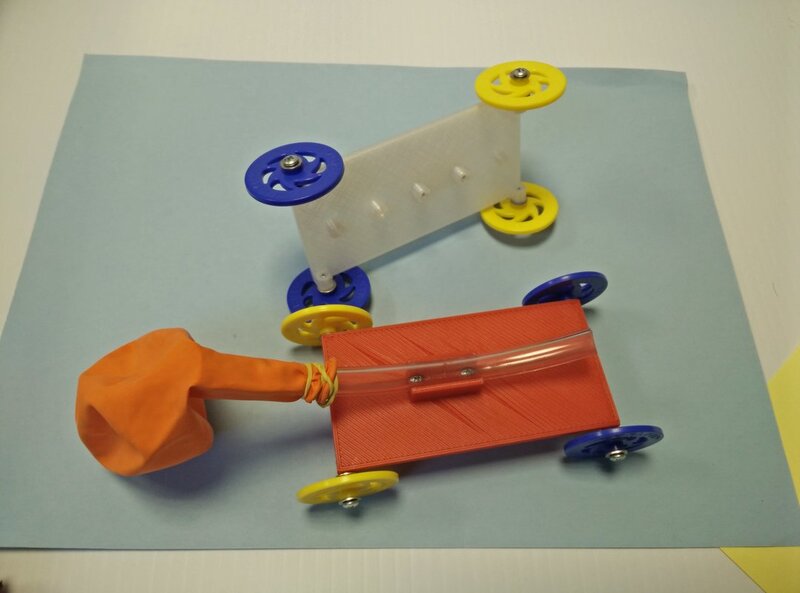 balloon-powered cars built on a chassis of 3-D printed parts