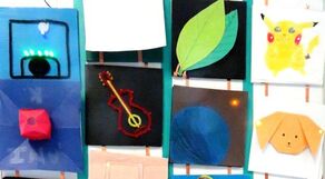 Several finished light up tile projects including a guitar, leaves, and pikachu
